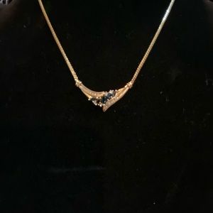 10kt gold, sapphire and diamond necklace.